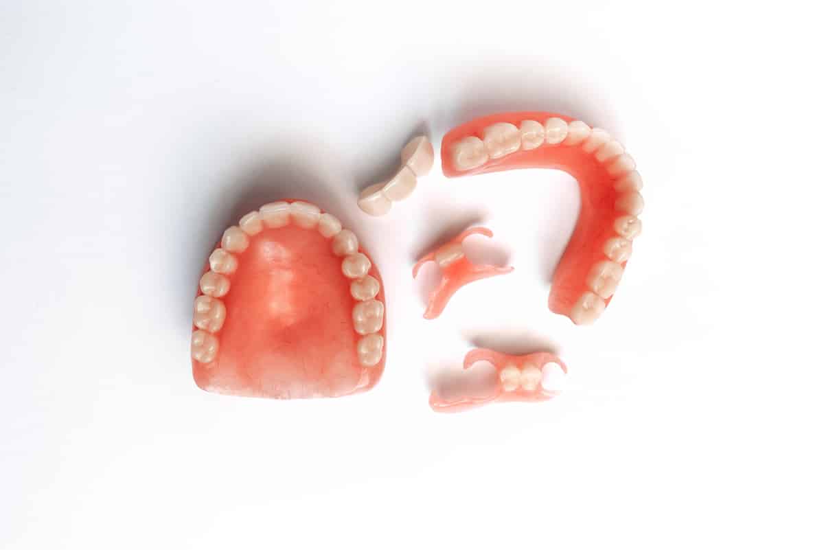 What Is the Difference Between a Dental Bridge and a Partial Denture?